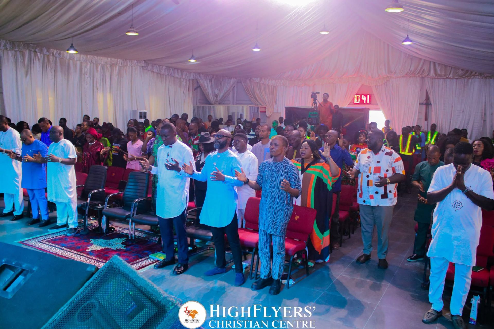 Congregation standing in worship